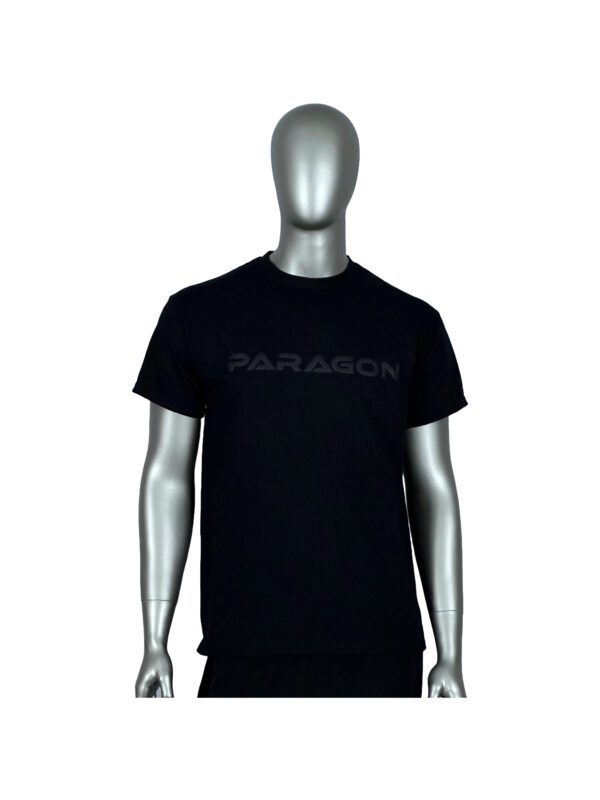 A man wearing a black t-shirt with the word paragon on it.