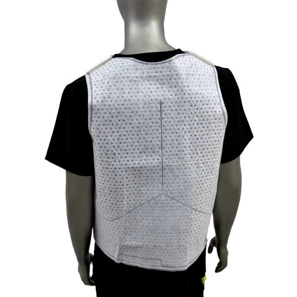A man wearing a white vest with dots on it.