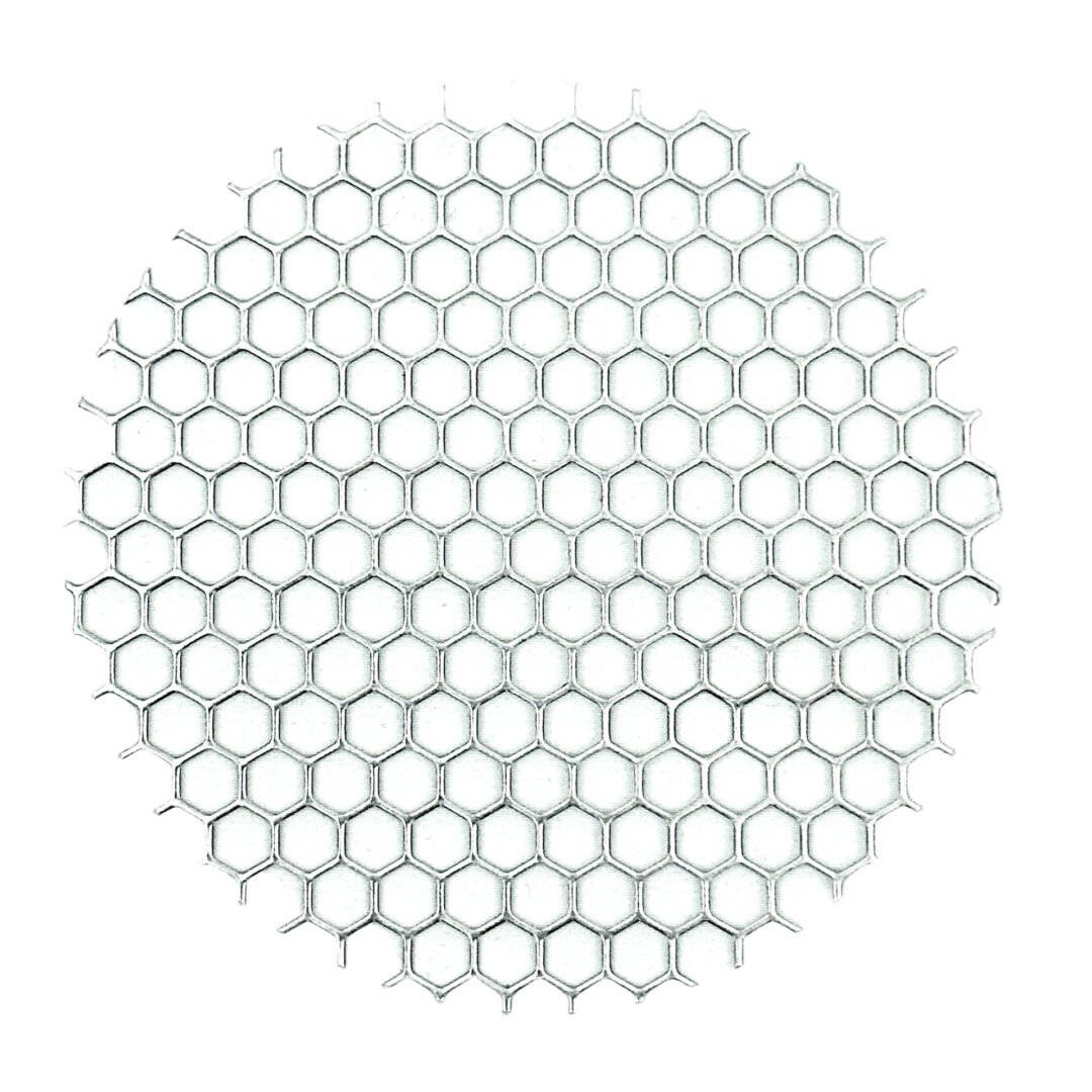 A white tile with a circle of dots